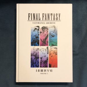 Final Fantasy Ultimania Volume 1 on a bed of blue velvet